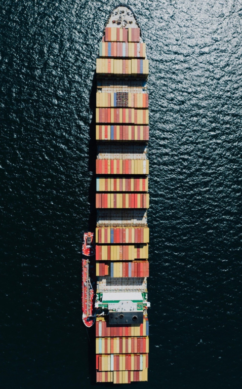Aerial view of a cargo ship on the ocean.